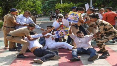 Youth Congress workers protest outside SEBI headquarters in Mumbai